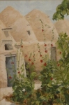 Beehive houses and hollyhocks